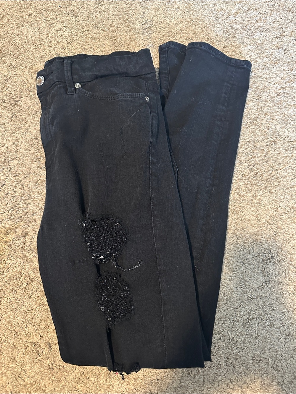 Good American Black Skinny Jeans with Distressed Panels